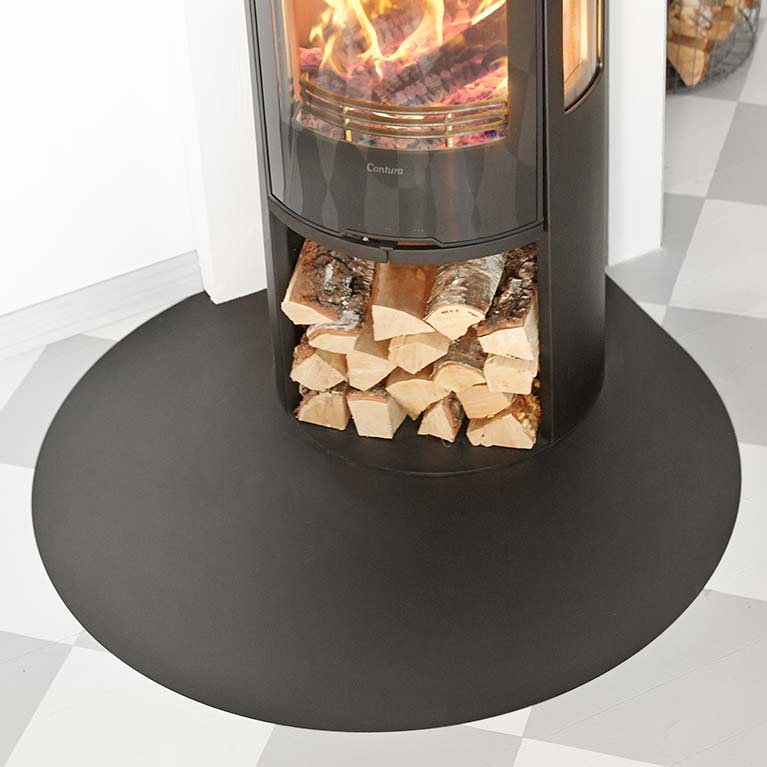 Ellipse-shaped floor protector for wood burning stoves
