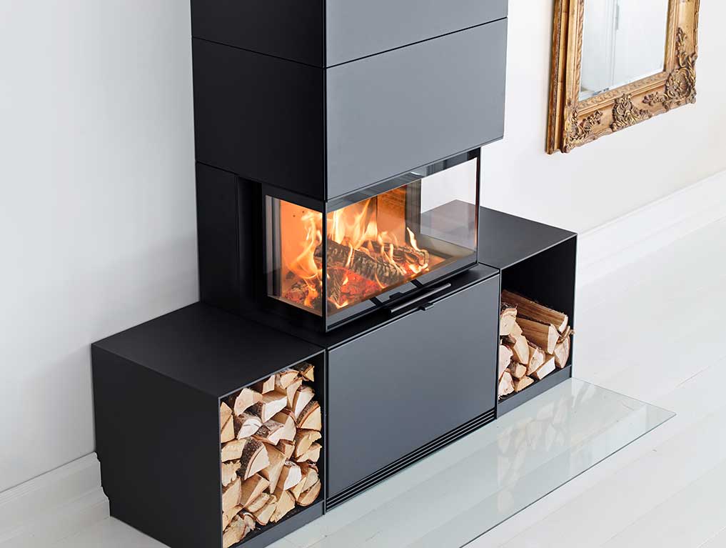 The fireplace can be placed directly against a combustible wall