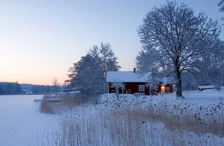 Landscape with house coverd in snow