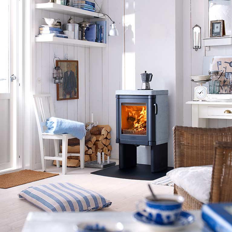 Cast iron stoves with heat-storing soapstone spreading the heat